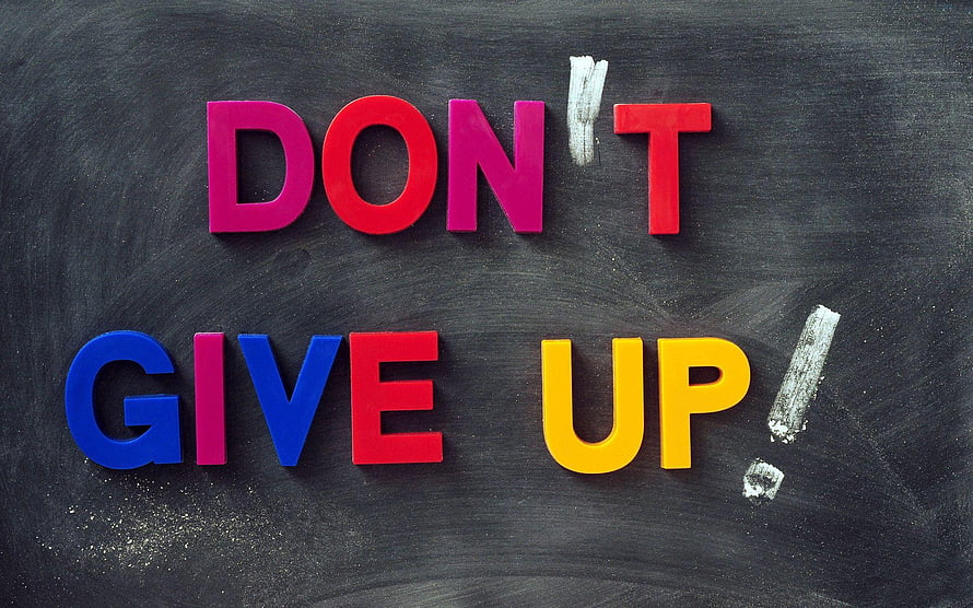 Colorful 3D Letters Spelling Don't Give Up on a Dark Chalkboard Background HD wallpaper