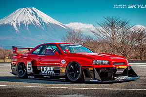 Red Liberty Walk Nissan Skyline R34 Widebody with Mount Fuji Background HD wallpaper