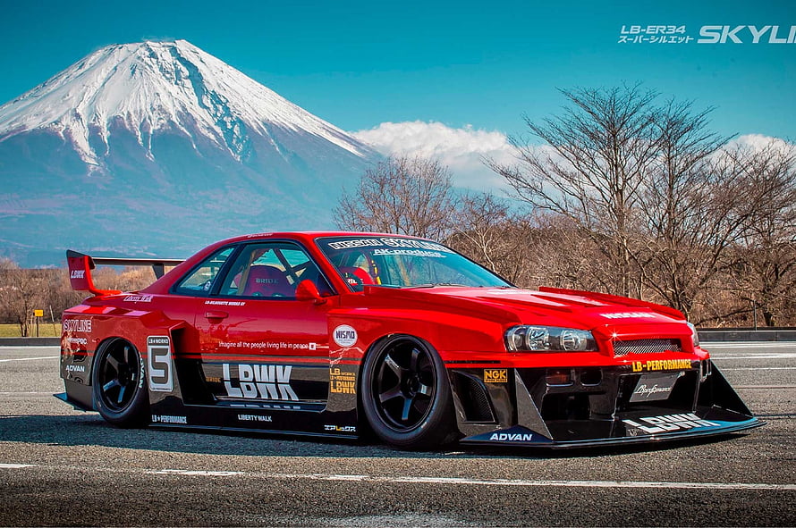 Red Liberty Walk Nissan Skyline R34 Widebody with Mount Fuji Background HD wallpaper