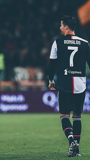 Cristiano Ronaldo Walking on the Pitch in Juventus Black Kit HD phone wallpaper