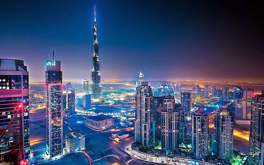 Burj Khalifa and Dubai Skyline at Night with Vibrant City Lights HD wallpaper