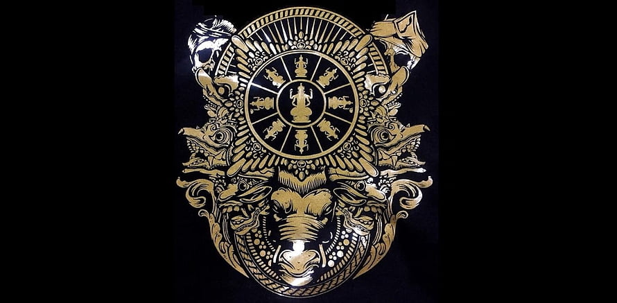 Majapahit Empire Emblem with Golden Lion and Wheel of Dharma on Black Background HD wallpaper