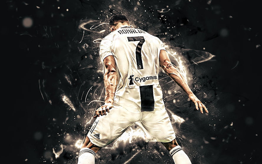 Cristiano Ronaldo in White Juventus Kit with Dramatic Particle Effects HD wallpaper