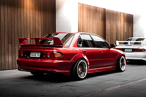 Red Mitsubishi Lancer Evolution III GSR with Widebody Kit and Large Rear Wing HD wallpaper