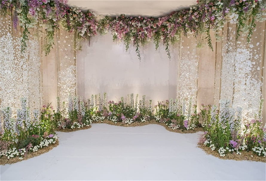 Romantic Wedding Ceremony Backdrop with Lush Floral Arrangements and Draped Greenery HD wallpaper
