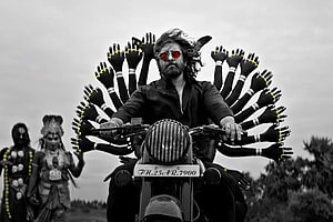 Vikram as Mahaan on motorcycle with multi-armed divine backdrop in Chiyaan 60 HD wallpaper