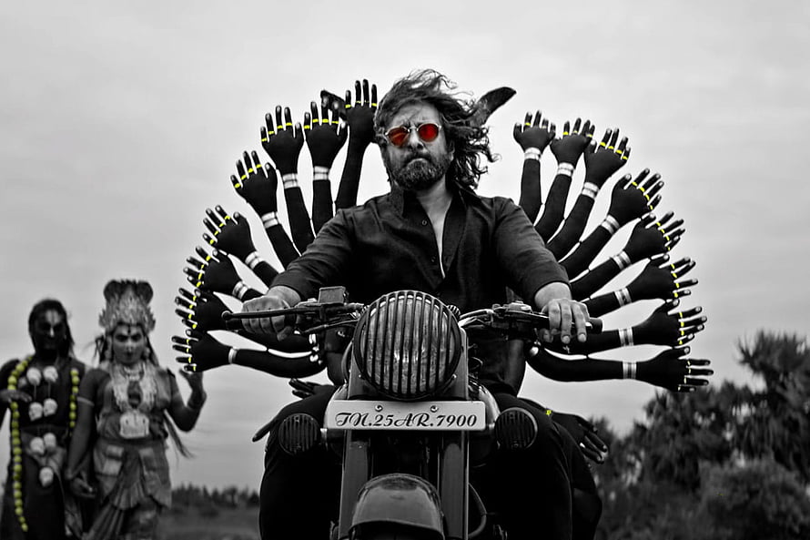 Vikram as Mahaan on motorcycle with multi-armed divine backdrop in Chiyaan 60 HD wallpaper