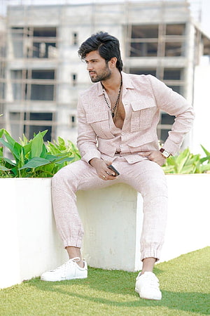 Vijay Devarakonda in a Light Pink Linen Suit with White Sneakers HD phone wallpaper