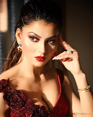 Urvashi Rautela in a Deep Red Sequined Gown with Dramatic Makeup and Jewelry HD phone wallpaper
