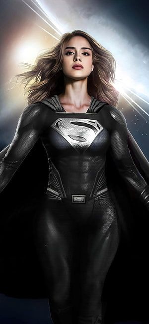 Sasha Calle as Supergirl in a sleek black tactical suit with dramatic backlighting and flowing hair HD phone wallpaper