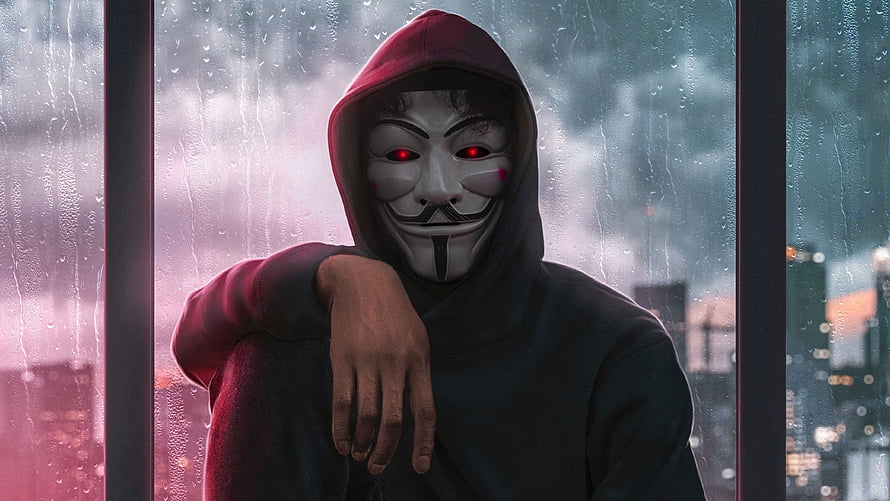 Anonymous Guy Fawkes Mask Figure in Red Hoodie Against Rainy City Window HD wallpaper