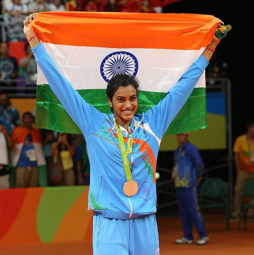 P V Sindhu Celebrating Victory With Indian Flag And Olympic Medal HD phone wallpaper