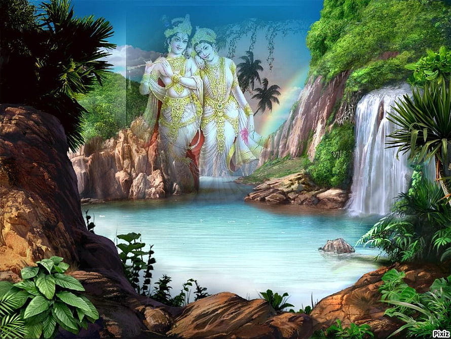 Ethereal Indian Couple in Traditional Attire Amidst Tropical Waterfall and Lush Jungle Landscape HD wallpaper