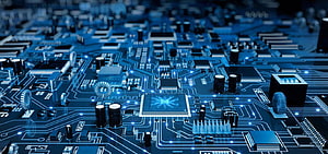 Glowing Blue Microprocessor on a Complex Printed Circuit Board with Electronic Components HD wallpaper