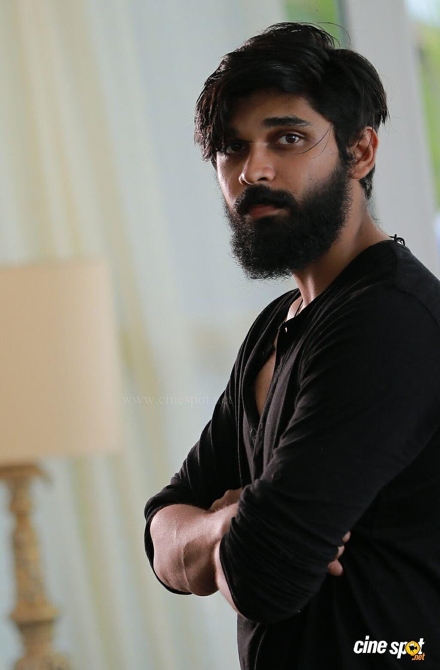 Dhruv Vikram in Adithya Varma with full beard and black shirt HD phone wallpaper