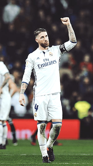Sergio Ramos in Real Madrid Home Kit Raising Fist on the Pitch HD phone wallpaper
