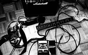 Black and White Electric Guitar with Marshall Amp and Pedals on Wooden Floor HD wallpaper