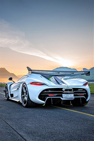 Koenigsegg Jesko Rear View on Track at Sunset with Mountains in Background HD phone wallpaper