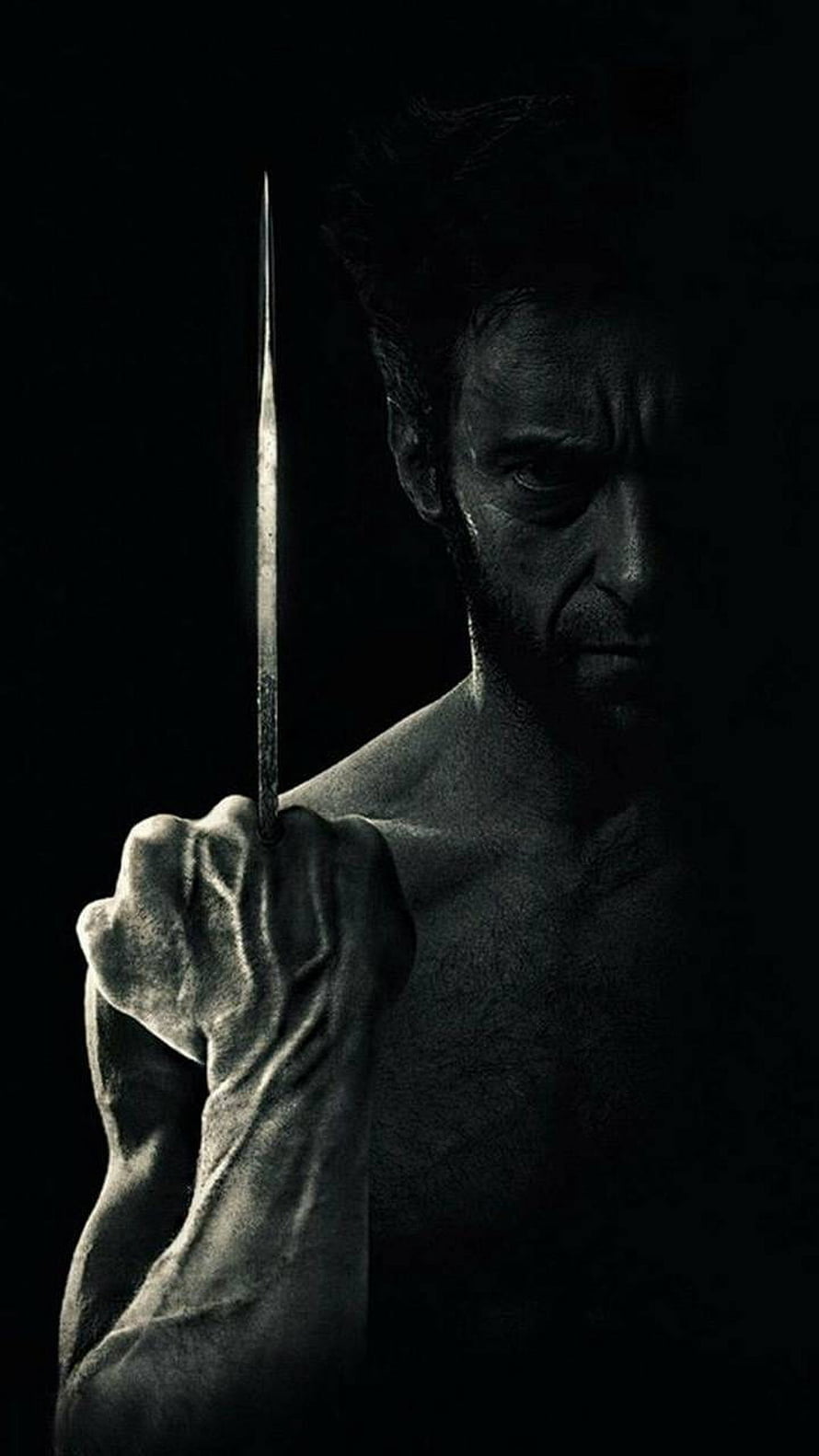Logan Wolverine Dark Portrait Holding Metal Claw in Dramatic Low-Key Lighting HD phone wallpaper