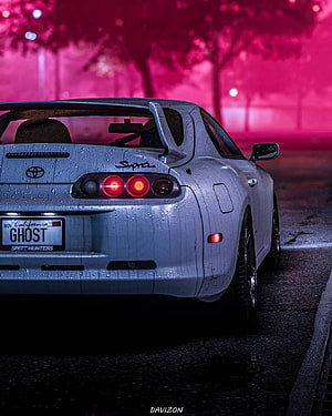 Silver Toyota Supra Rear View on Wet Street with Neon Pink Background HD phone wallpaper