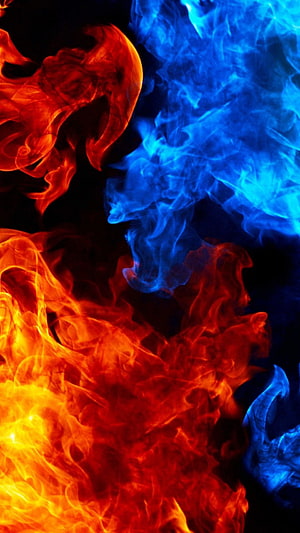 Vibrant Red and Blue Fire Plumes Swirling Against a Dark Background HD phone wallpaper