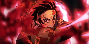 Tanjiro Kamado unleashing Sun Breathing in Demon Slayer with fiery red energy and katana HD wallpaper