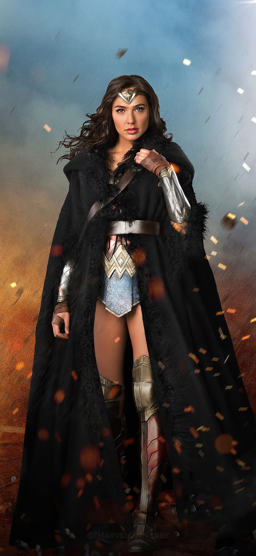 Gal Gadot as Wonder Woman in a dramatic black cloak and golden armor HD phone wallpaper