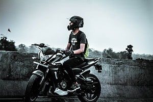 Rider on a Pulsar NS200 Motorcycle on a Concrete Overpass HD wallpaper