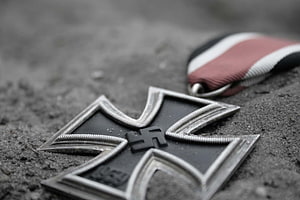 Close-up of a German Iron Cross military medal resting on a textured surface, Nazi , Amazing High Resolution Nazi & Backgrounds, swastika 1920x1080 HD wallpaper