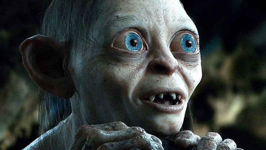 Gollum Close-Up Portrait with Wide Blue Eyes and Elongated Ears from The Lord of the Rings HD wallpaper