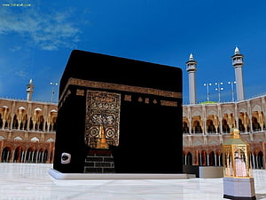The Kaaba in Makkah with Golden Door and Minarets Under a Clear Blue Sky HD wallpaper