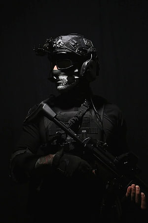 Tactical Soldier in Full Black Gear with Skull Face Paint and Assault Rifle HD phone wallpaper