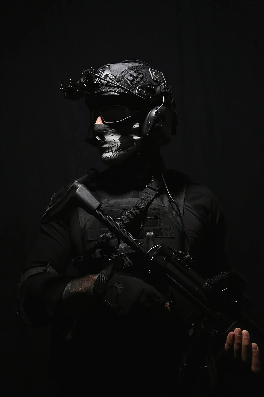 Tactical Soldier in Full Black Gear with Skull Face Paint and Assault Rifle HD phone wallpaper