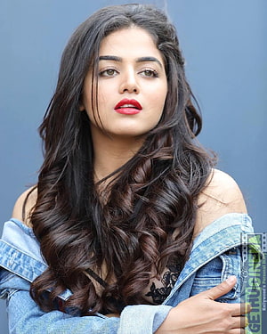 Wamiqa Gabbi Portrait in Off-Shoulder Denim Jacket with Long Wavy Hair HD phone wallpaper