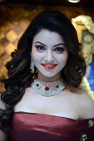 Urvashi Rautela in a Maroon Strapless Gown with Diamond and Ruby Jewelry HD phone wallpaper