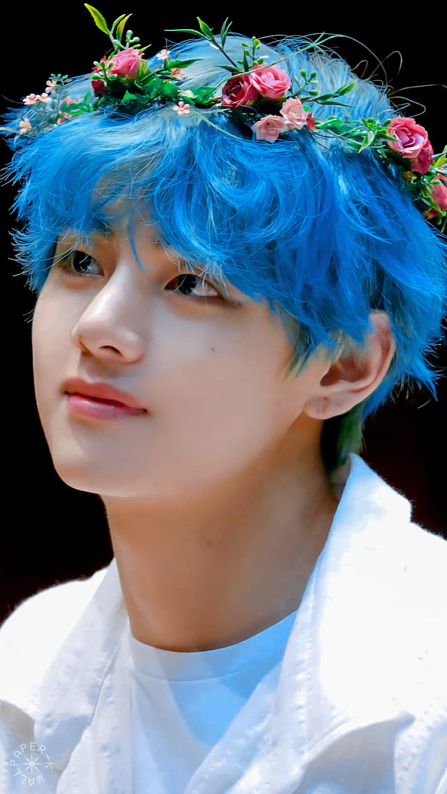 BTS V with vibrant blue hair and a delicate floral crown in a white shirt HD phone wallpaper