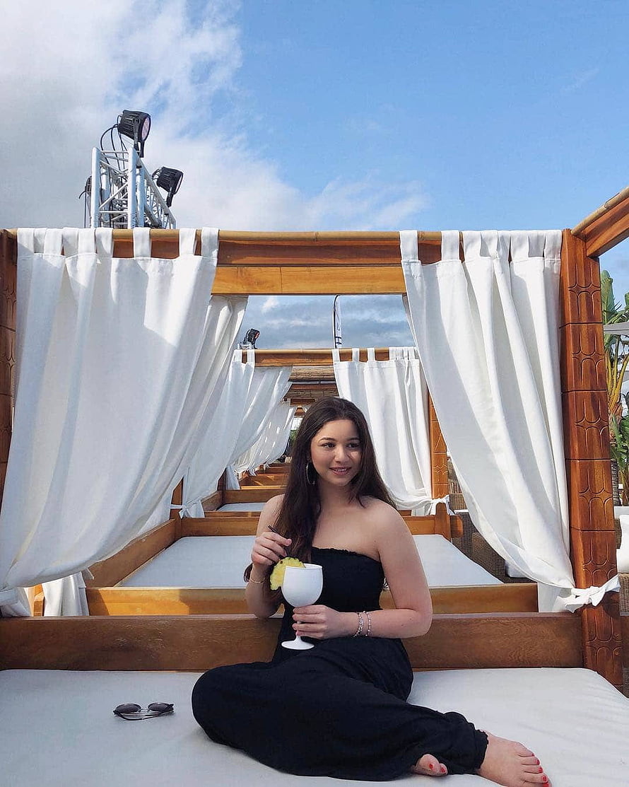 Sara Tendulkar Relaxing On A Beach Cabana With A Cocktail HD phone wallpaper