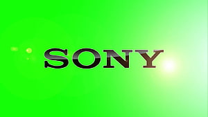 Sony Brand Logo on Vibrant Green Gradient Background with Lens Flare Effect HD wallpaper