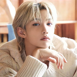Felix from Stray Kids in a cozy cream knit sweater with soft blonde hair HD phone wallpaper