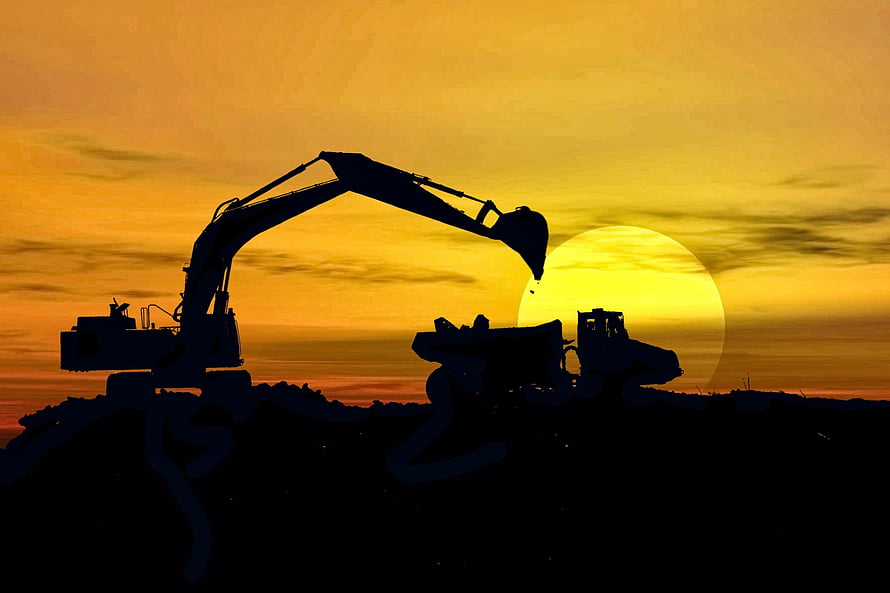 Heavy Excavator Silhouette Against Golden Sunset at Coal Mining Site HD wallpaper