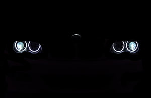 BMW Angel Eyes Headlights Glowing in Darkness HD wallpaper