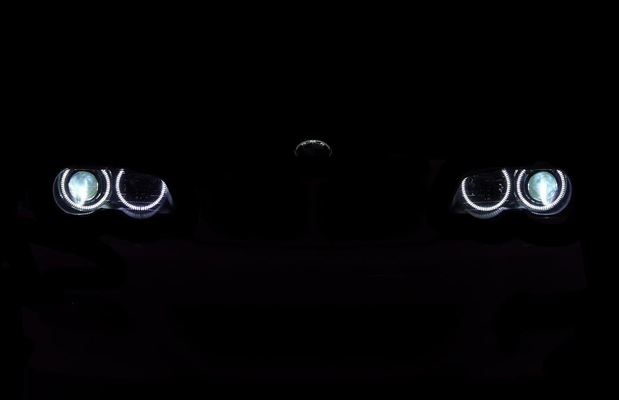 BMW Angel Eyes Headlights Glowing in Darkness HD wallpaper