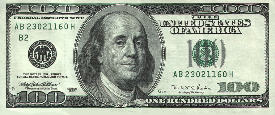 Close-up of a United States one hundred dollar bill featuring Benjamin Franklin HD wallpaper