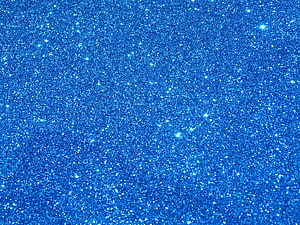 Vibrant Blue Glitter Texture with Sparkling White Highlights and Deep Blue Background HD wallpaper