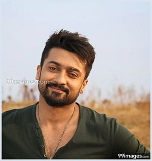 Surya Actor Portrait in Green Henley Shirt with Styled Hair and Beard HD phone wallpaper