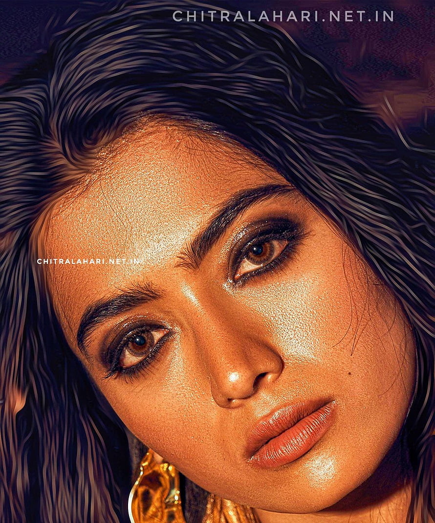 Rashmika Mandanna Close-Up Portrait with Dramatic Makeup and Golden Earring HD phone wallpaper