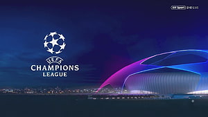 UEFA Champions League Starball Logo Over Illuminated Stadium at Night HD wallpaper
