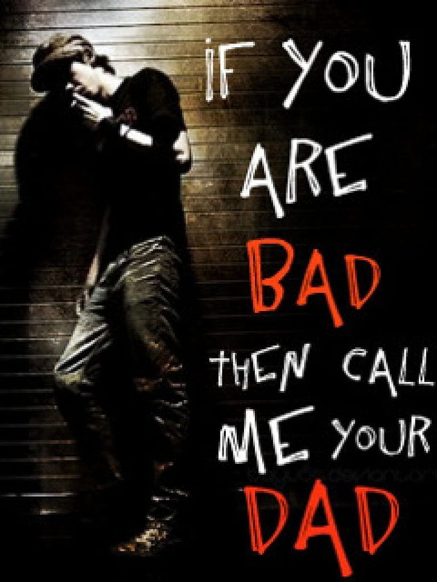 Edgy Male Portrait Against Dark Brick Wall With Bold Red And White Typography HD phone wallpaper