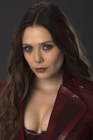 Elizabeth Olsen as Scarlet Witch in a red leather jacket with long wavy hair and a serious expression HD phone wallpaper