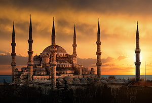 Sultan Ahmed Mosque Silhouette Against Golden Sunset Sky in Istanbul HD wallpaper